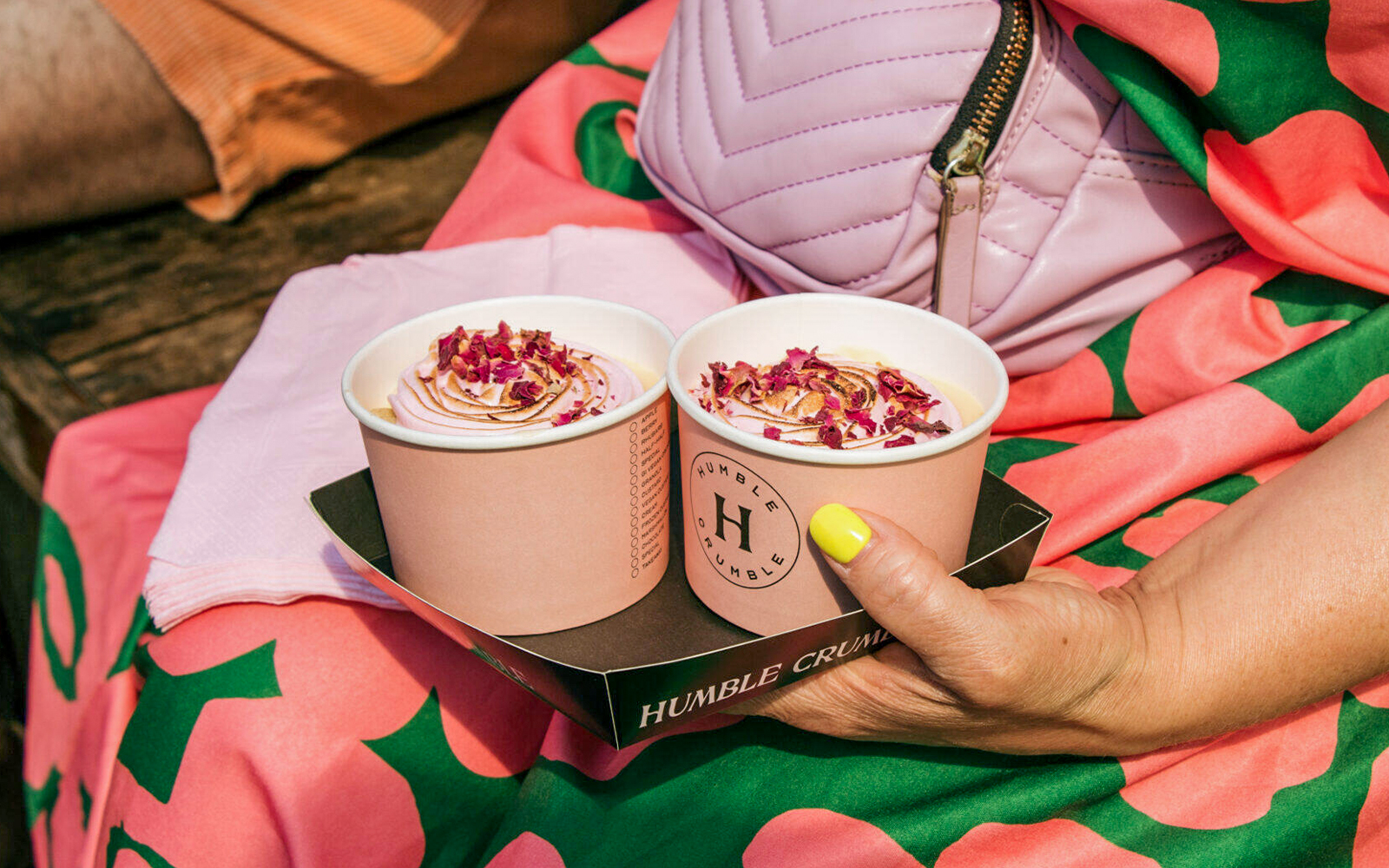 Humble Crumble desserts with rose petals on Brick Lane food tour, London.