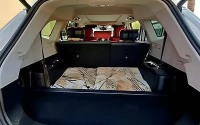 Luxor airport transfer vehicle interior with spacious luggage area.