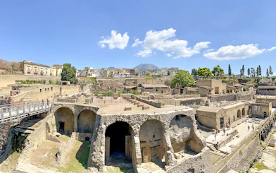 Ancient ruins of Herculaneum with Mount Vesuvius in the background, Italy.