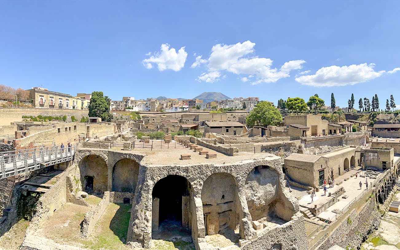 Ancient ruins of Herculaneum with Mount Vesuvius in the background, Italy.