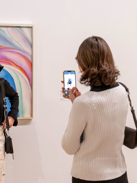 Guests viewing artwork at Whitney Museum of American Art.