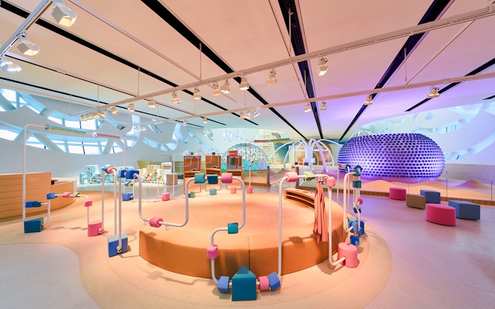 Interactive exhibit at Museum of the Future, Dubai, featuring colorful play structures.