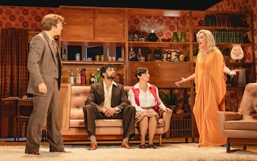 Stage scene from Abigail's Party in Westend with actors in a 1970s living room setting.