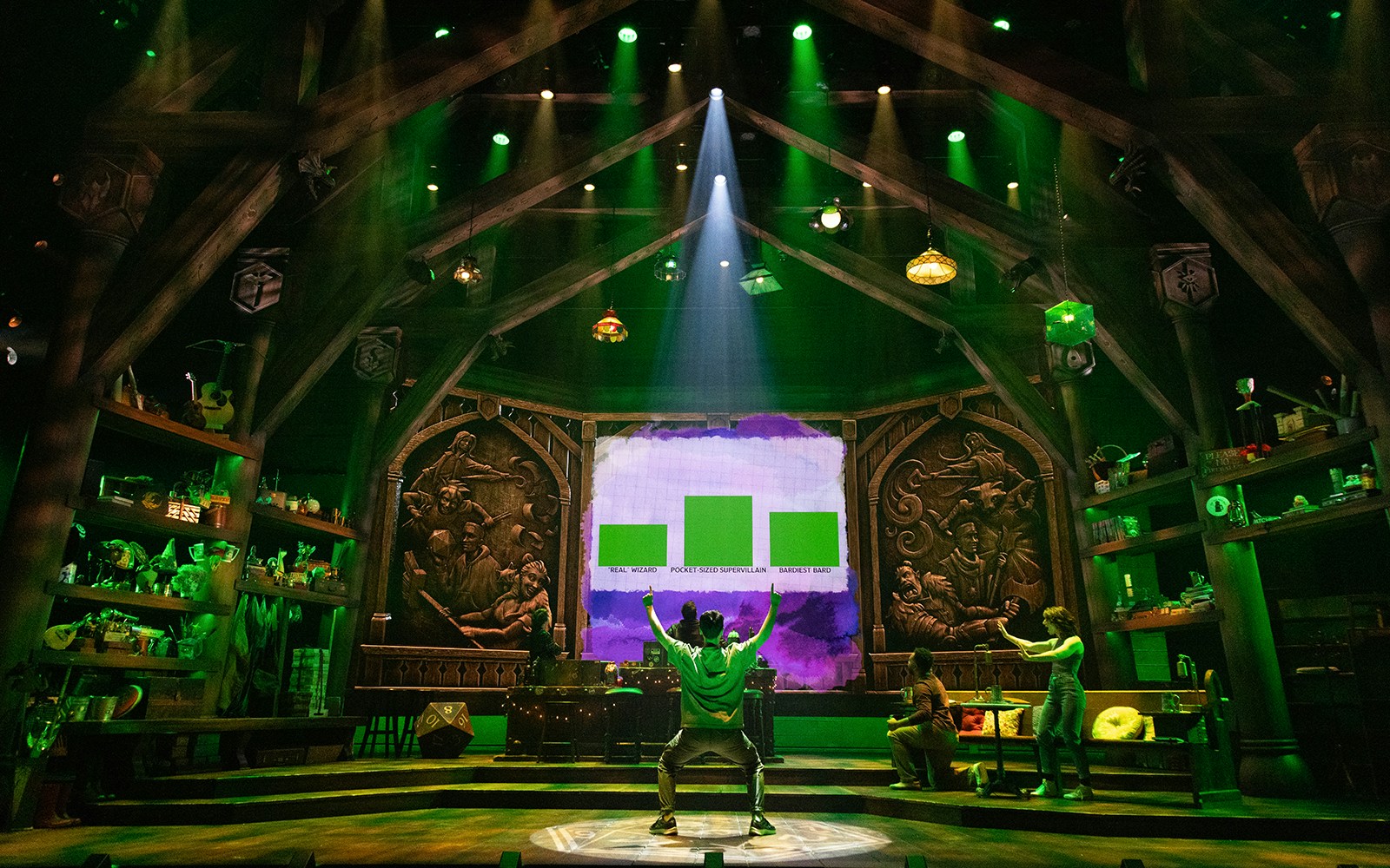 Stage set of Dungeons & Dragons: The Twenty-Sided Tavern with actors and fantasy decor.