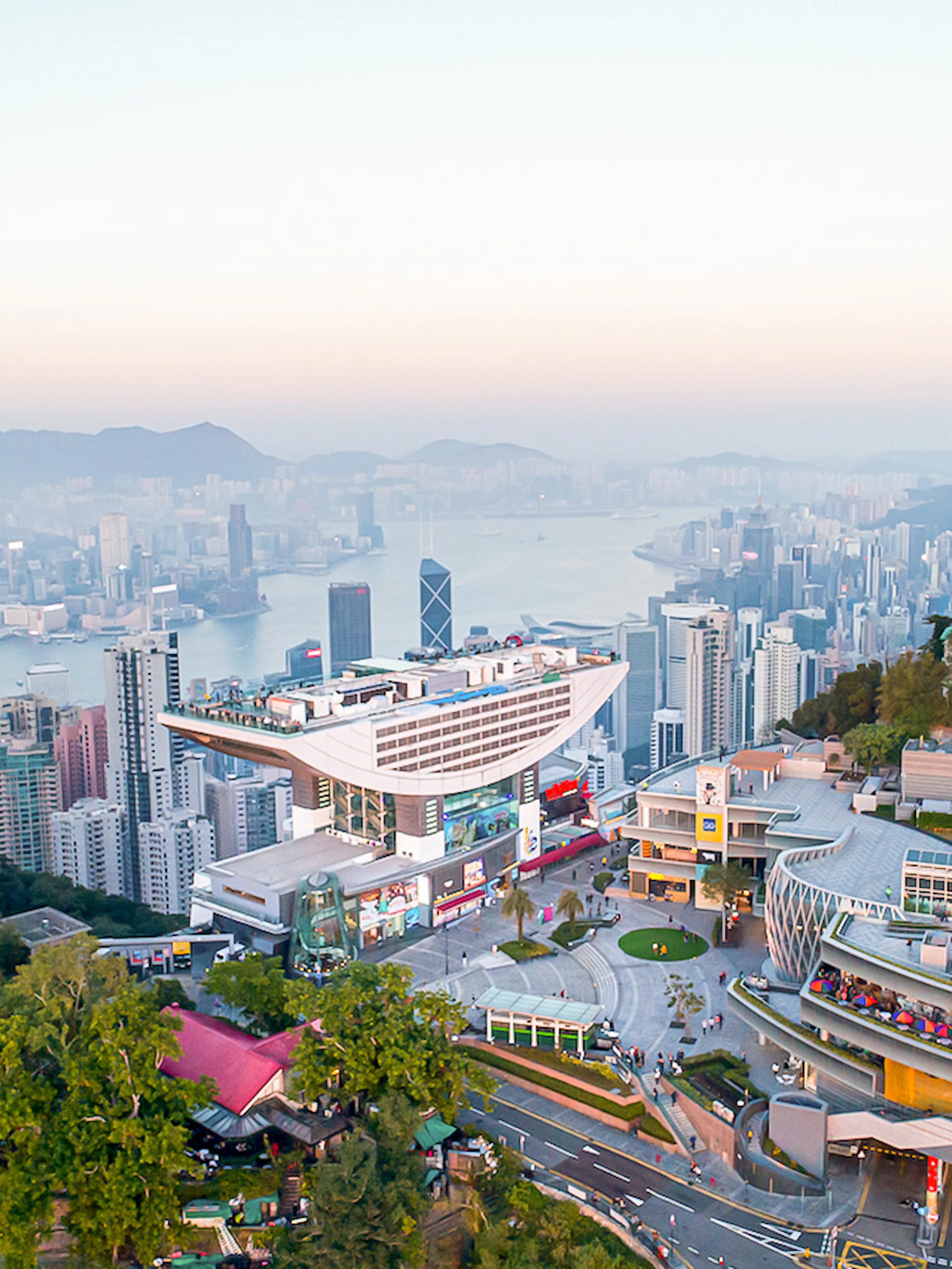 Aerial view of Sky Terrace 428 overlooking Hong Kong skyline and Victoria Harbour.