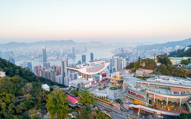 Aerial view of Sky Terrace 428 overlooking Hong Kong skyline and Victoria Harbour.