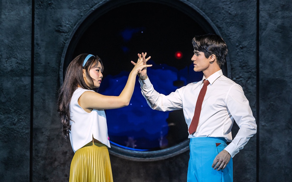 Actors performing a scene from Maybe Happy Ending Broadway show.