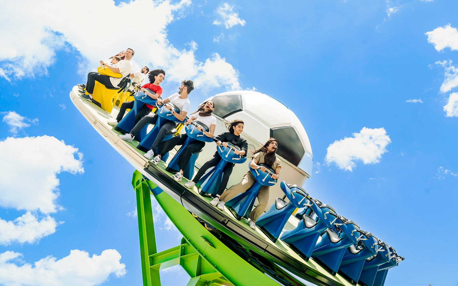 People enjoying a goal coaster ride at Dubai's Madrid Park.