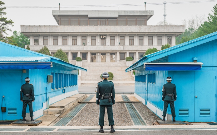 South Korean soldiers stand guard at the DMZ border between North and South Korea.