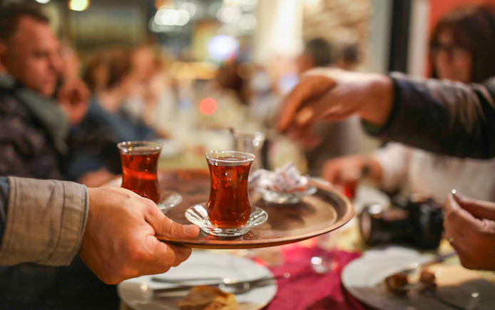 Turkish tea served on a tray during Istanbul Mosques & Palaces Tour.