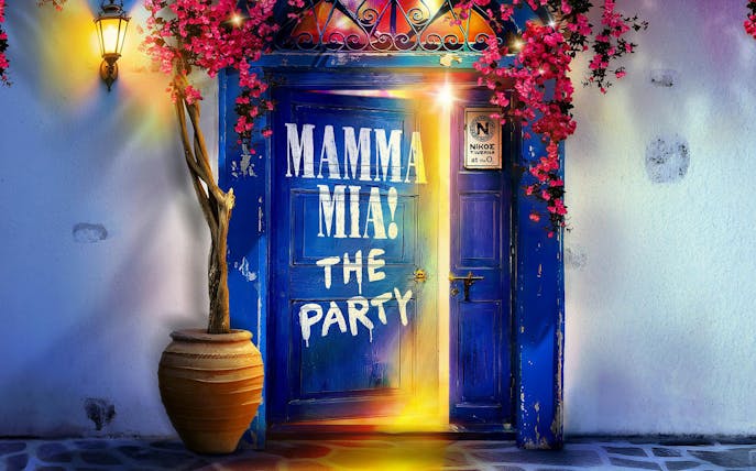 Blue door with "Mamma Mia! The Party" text, adorned with pink flowers, Westend.