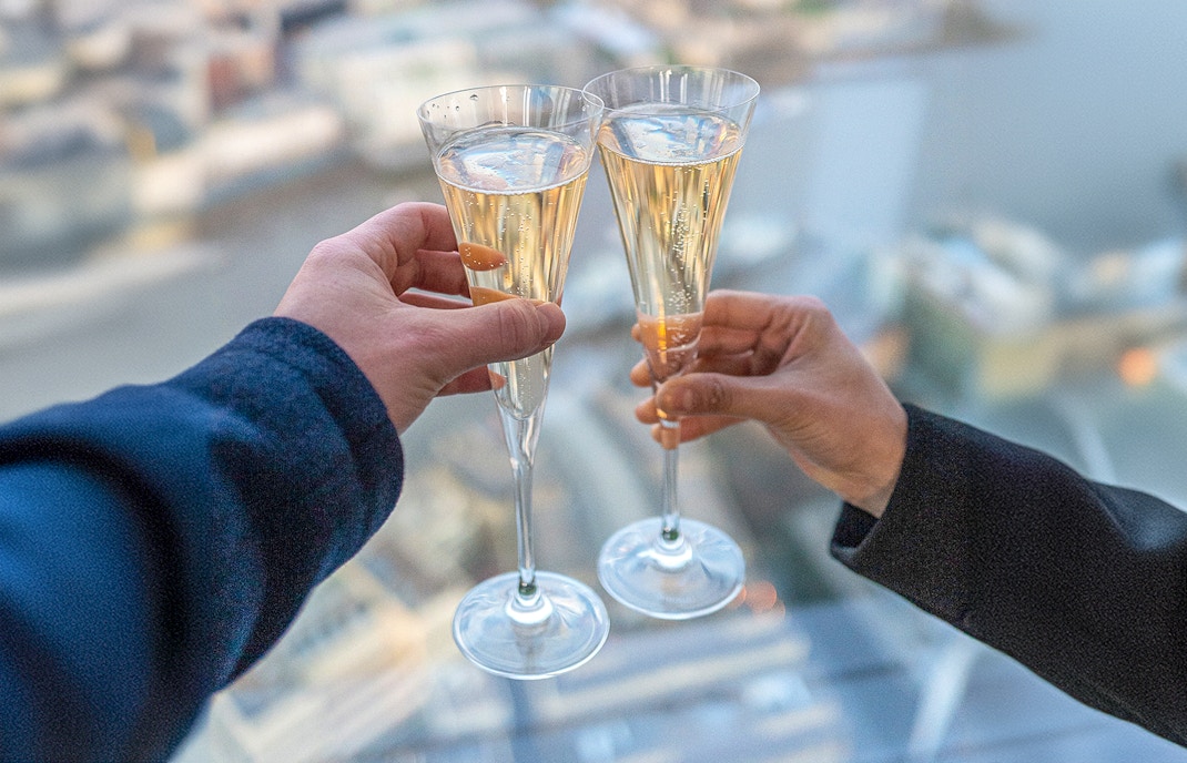 View from The Shard with champagne, London skyline