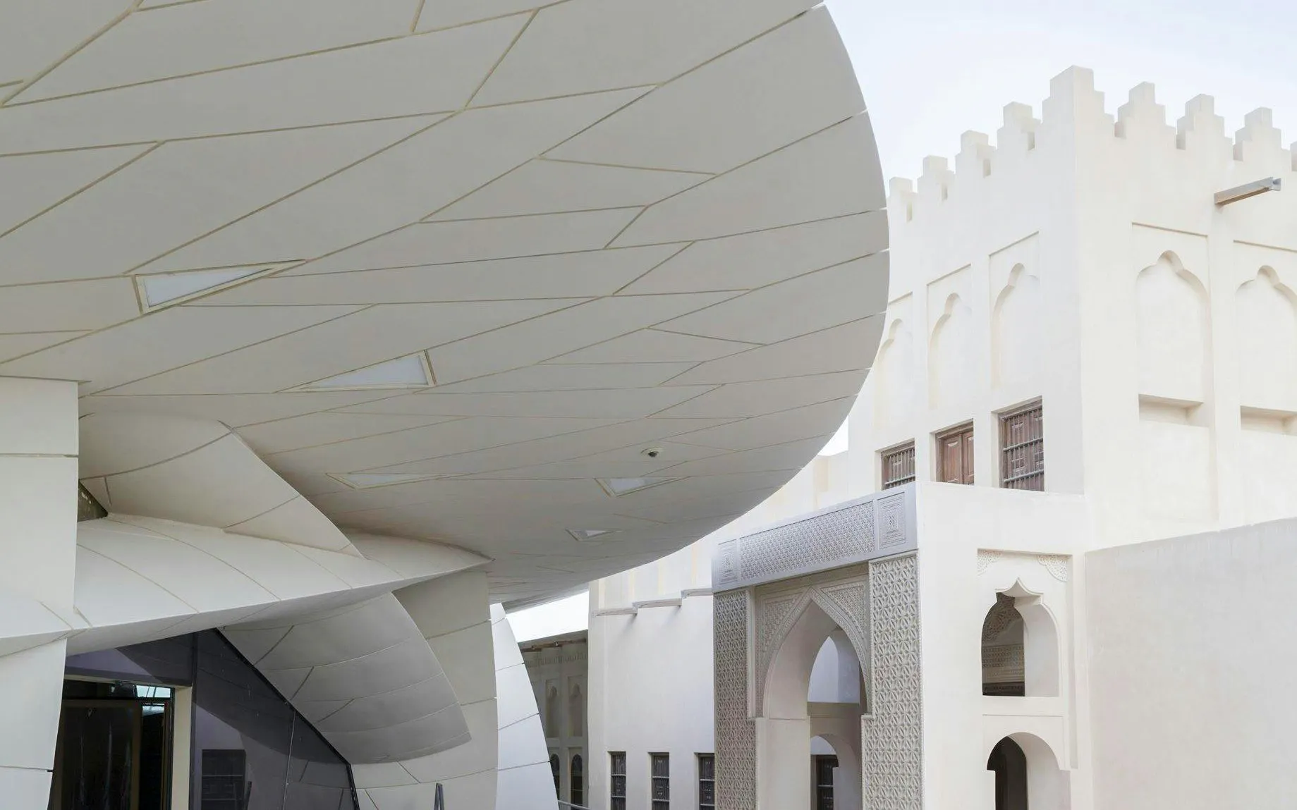 National Museum of Qatar's modern architecture with traditional design elements.