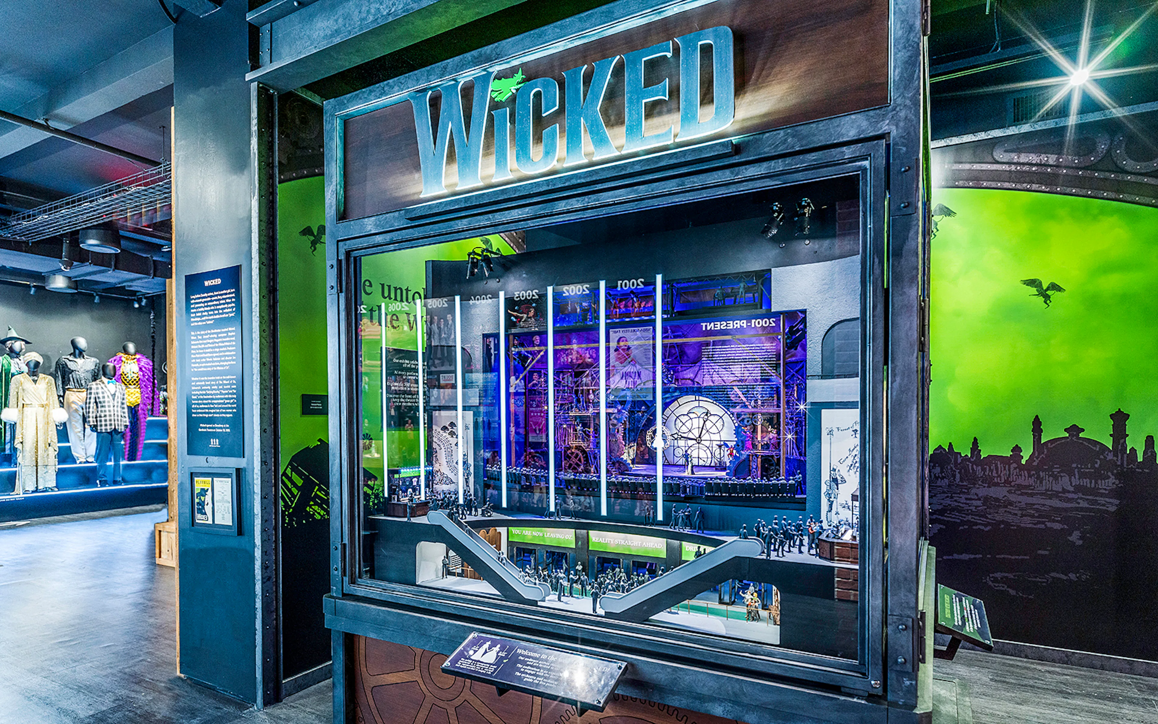 Wicked exhibit at the Museum of Broadway featuring costumes and stage model.