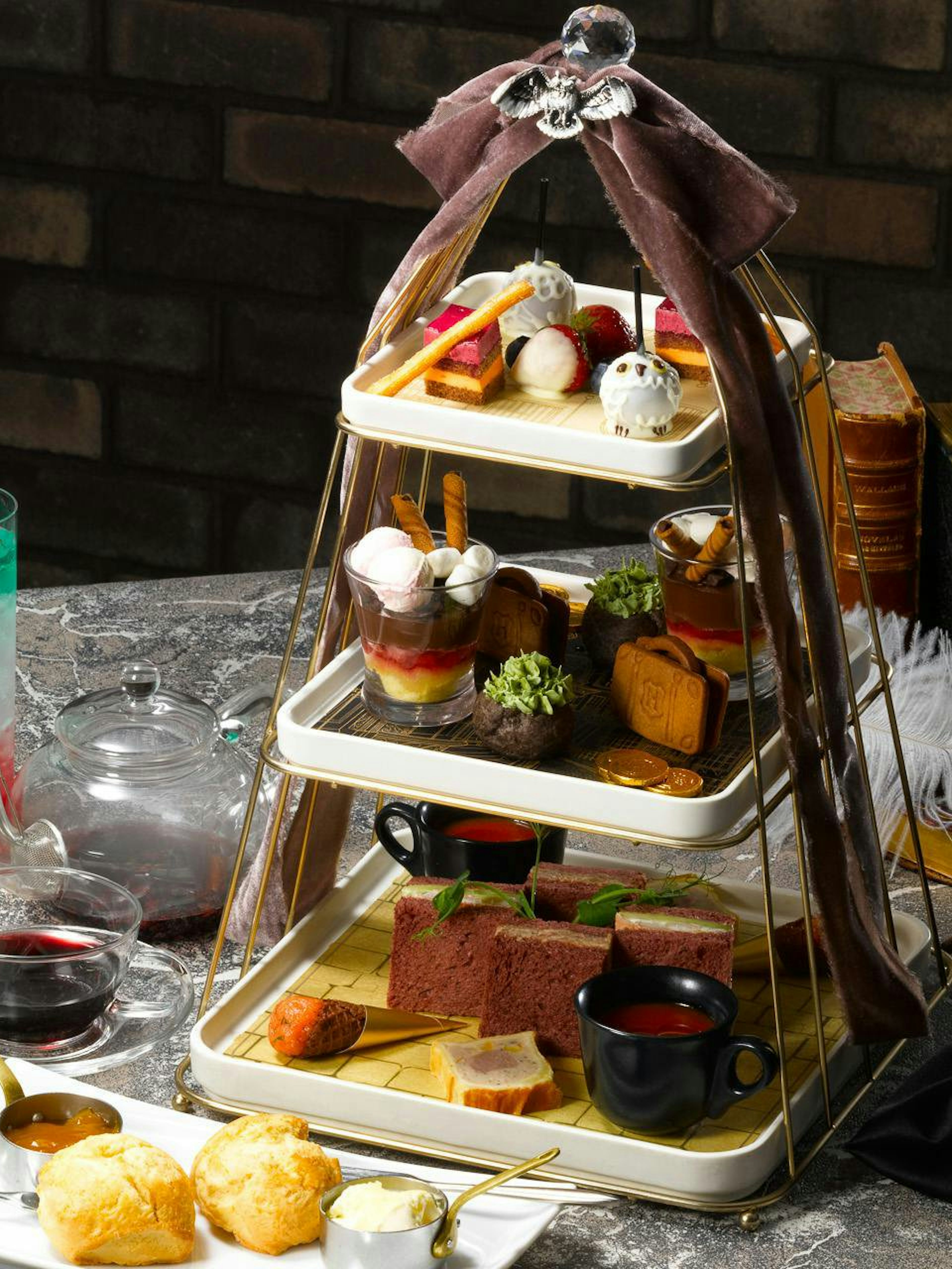 Afternoon tea set with themed pastries and drinks at Warner Bros. Studio Tour Tokyo.