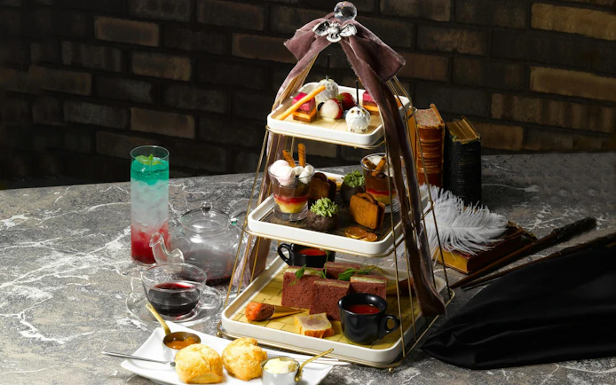 Afternoon tea set with themed pastries and drinks at Warner Bros. Studio Tour Tokyo.