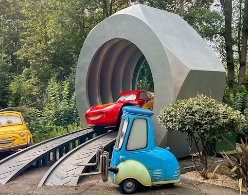 Cars Quatre Roues Rallye ride with character figures at Disneyland Paris.