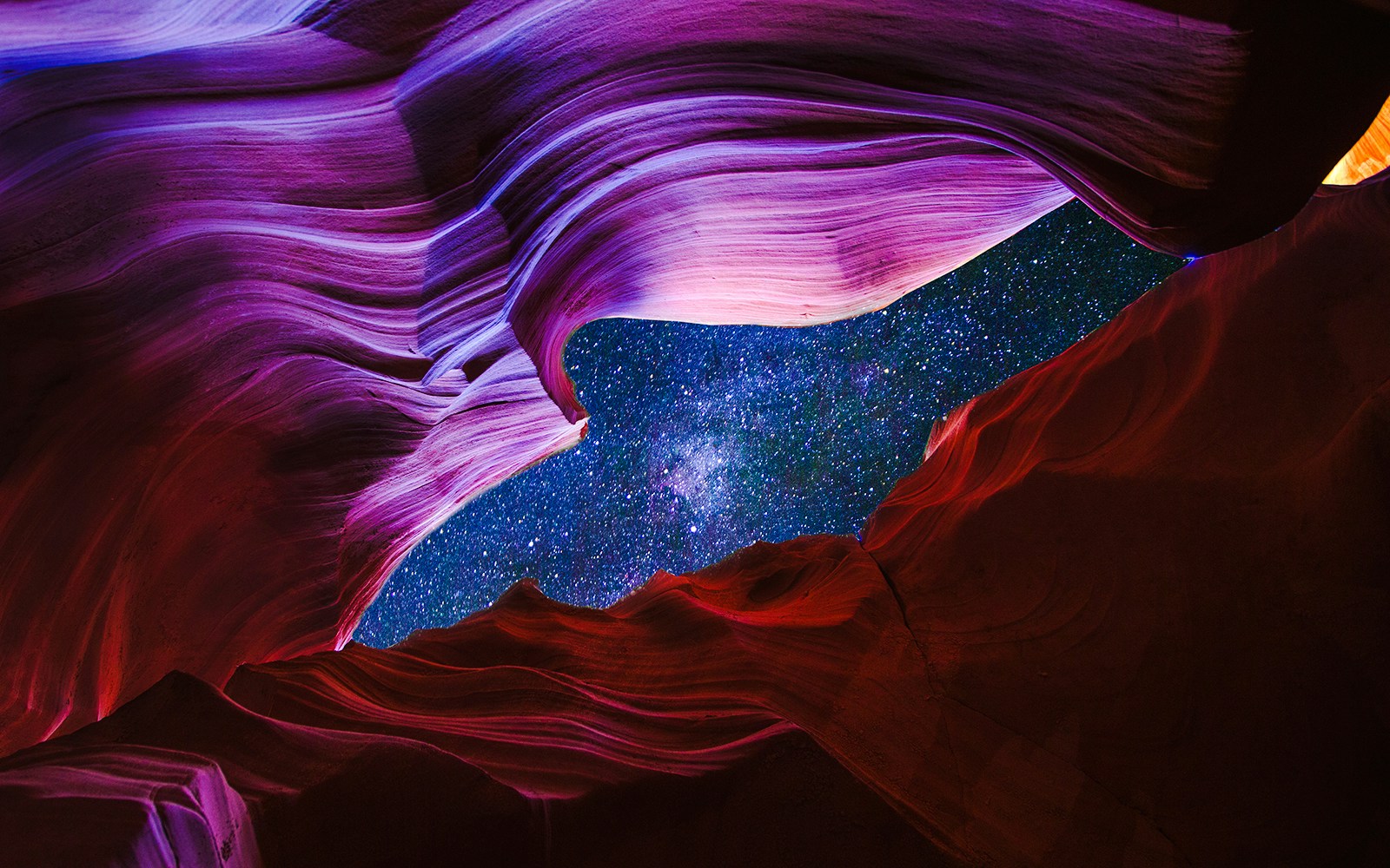 Antelope Canyon night sky view with vibrant rock formations.