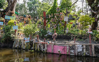 Dolls hanging on trees at Xochimilco's Island of the Dolls, Mexico City.