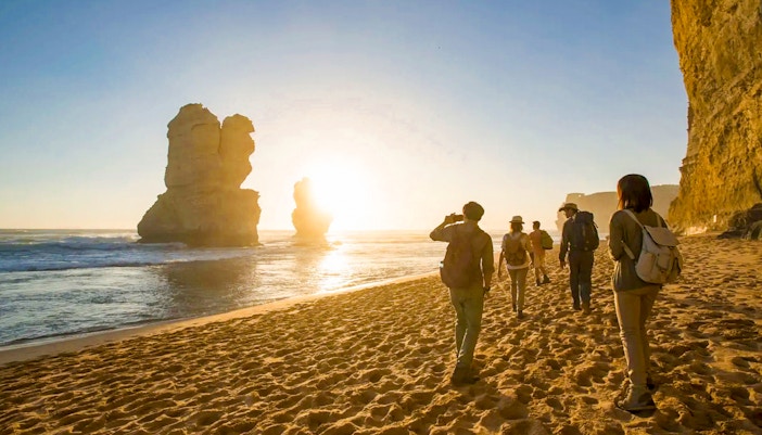 Great Ocean Road coastline with Twelve Apostles rock formations at sunset, Melbourne, Australia.
