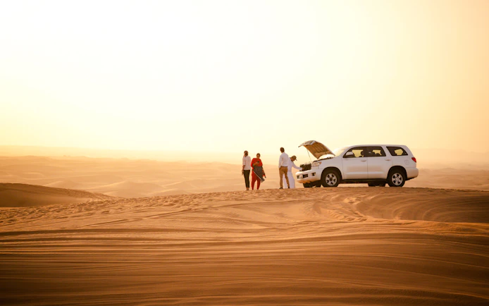 Dubai Morning Desert Safari with Dune Bashing, Sandboarding and Camel Ride