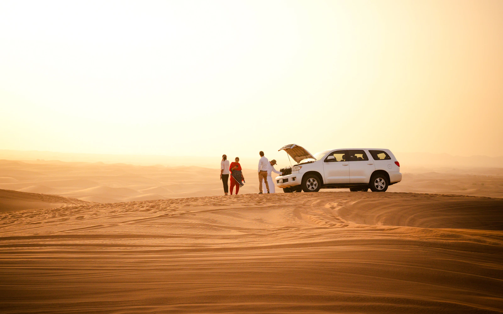 Dubai Morning Desert Safari with Dune Bashing, Sandboarding and Camel Ride