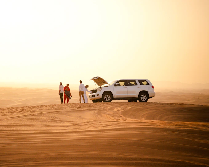 Dubai Morning Desert Safari with Dune Bashing, Sandboarding and Camel Ride