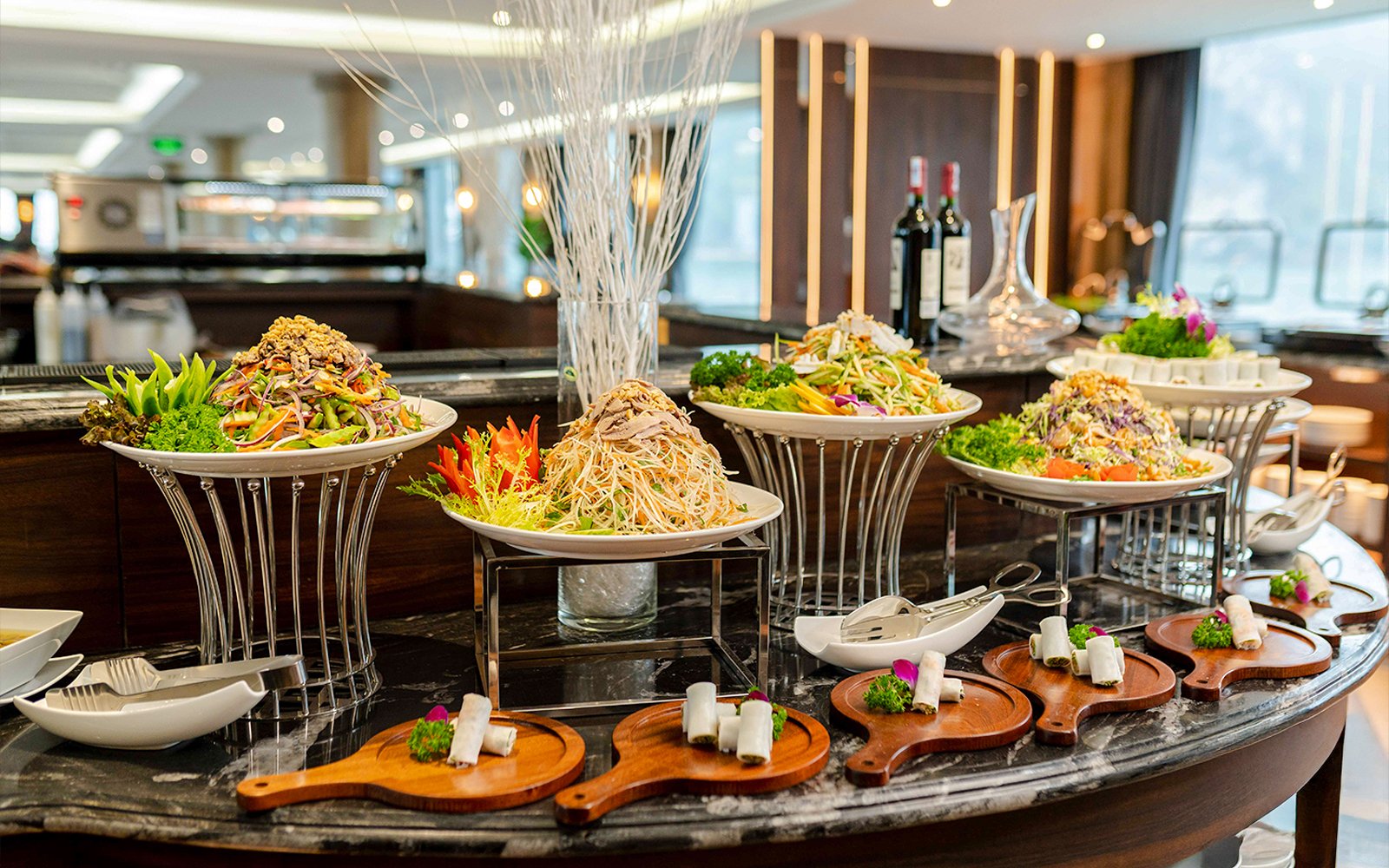 Buffet spread with salads and appetizers on Ambassador cruise.