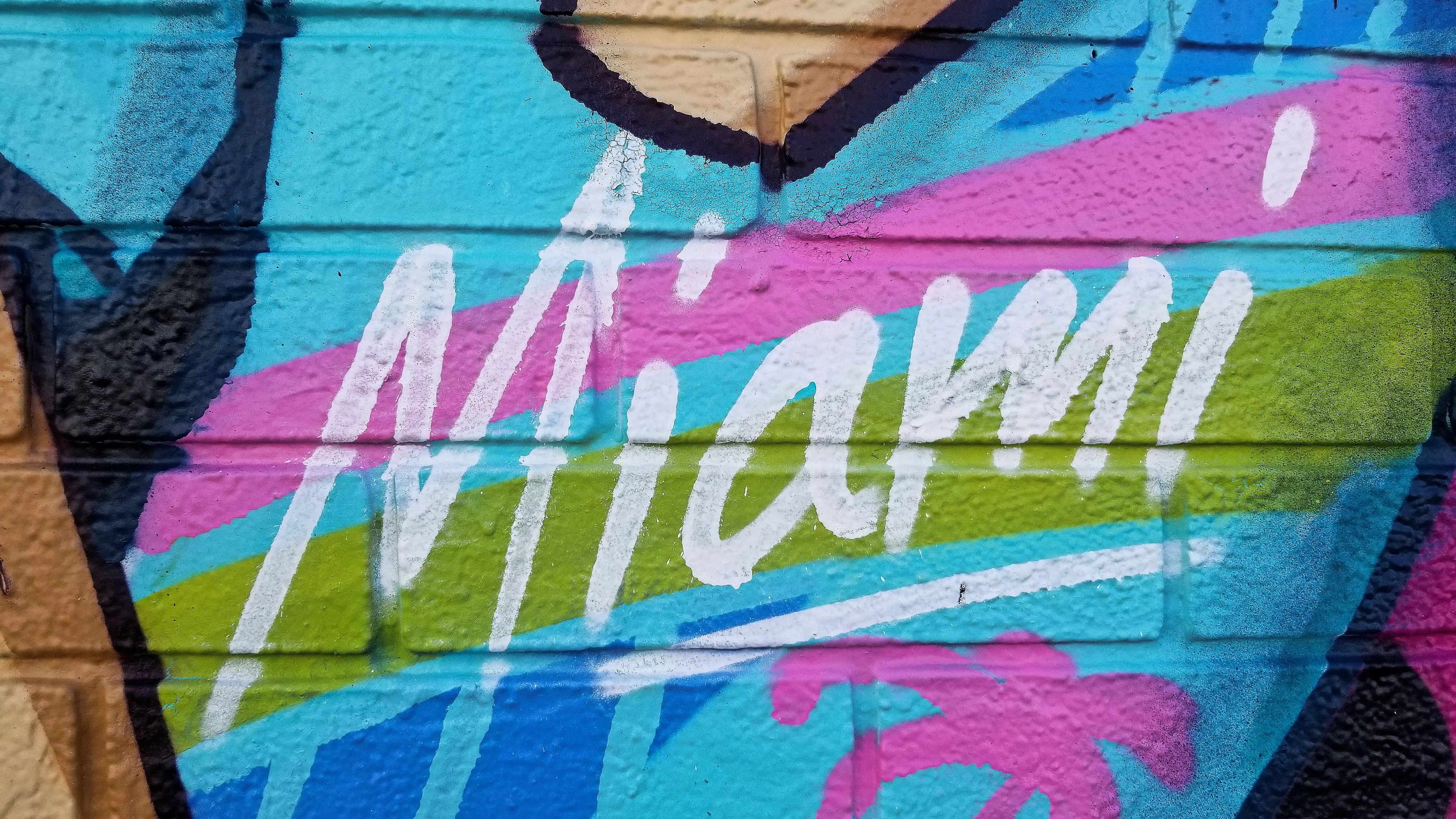 Wynwood Walls mural featuring vibrant street art in Miami's Wynwood Art District.