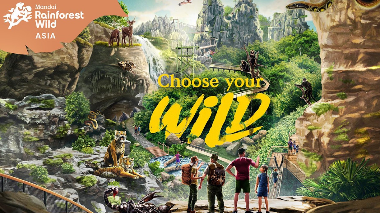 Visitors exploring Mandai Rainforest Wild Asia with diverse wildlife and lush landscapes.