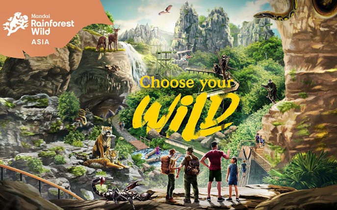 Visitors exploring Mandai Rainforest Wild Asia with diverse wildlife and lush landscapes.