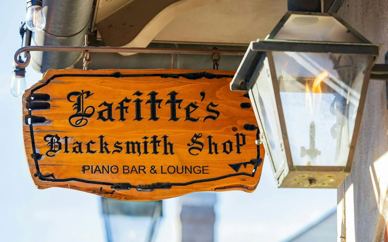 Lafitte's Blacksmith Shop sign with lantern, New Orleans.