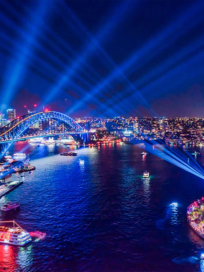 Sydney Harbour Bridge illuminated during Vivid Sydney festival.