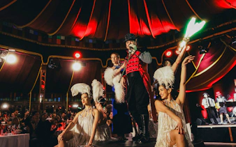 Burlesque performers on stage at The Mirage dinner show, Vienna.