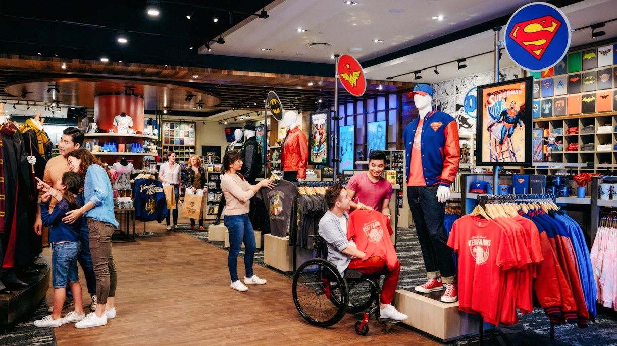 Guests exploring merchandise at Warner Bros. store in Los Angeles.