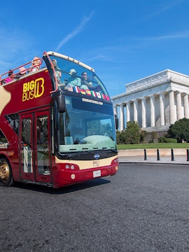 Big Bus tour in Washington DC passing the Lincoln Memorial.