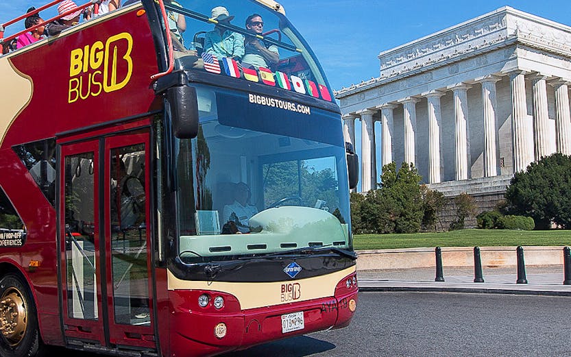 Big Bus tour in Washington DC passing the Lincoln Memorial.
