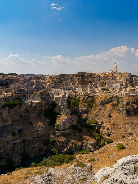 Ancient cityscape of Matera with rocky cliffs in Parco Regionale della Murgia Materana.