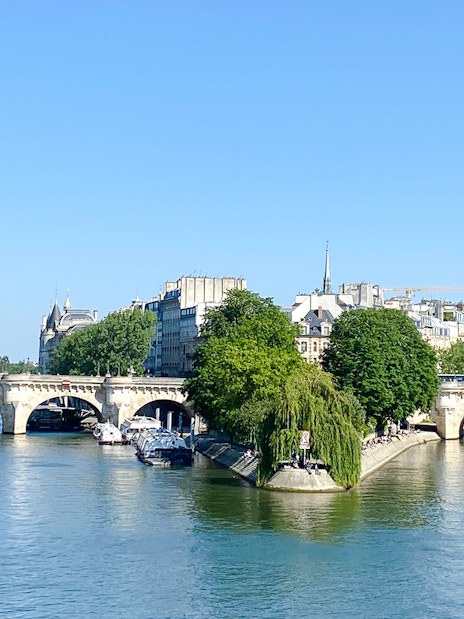 Seine River view with Pont Neuf bridge in Paris, part of the Treasure Hunt tour.