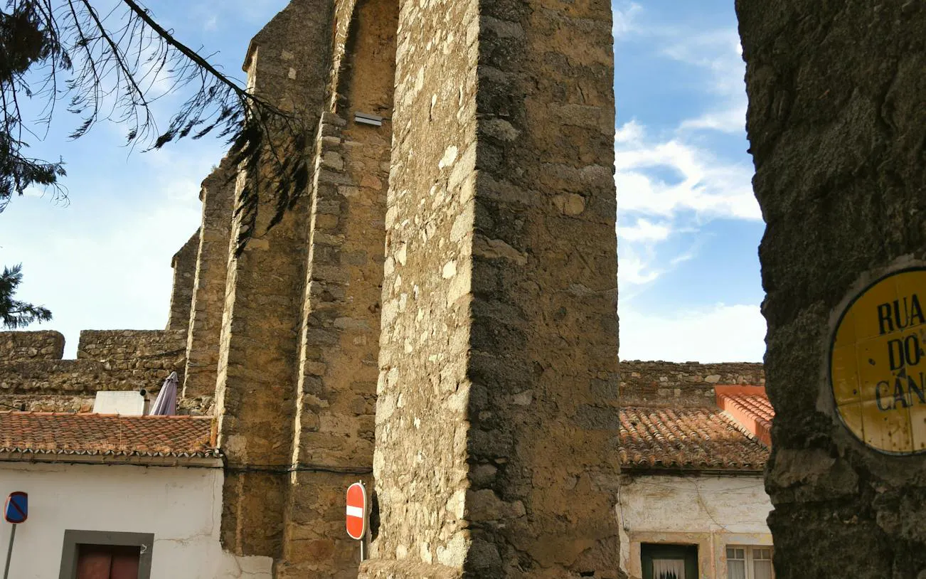Ancient stone walls in Évora, Portugal, part of the Alentejo private tour from Lisbon.