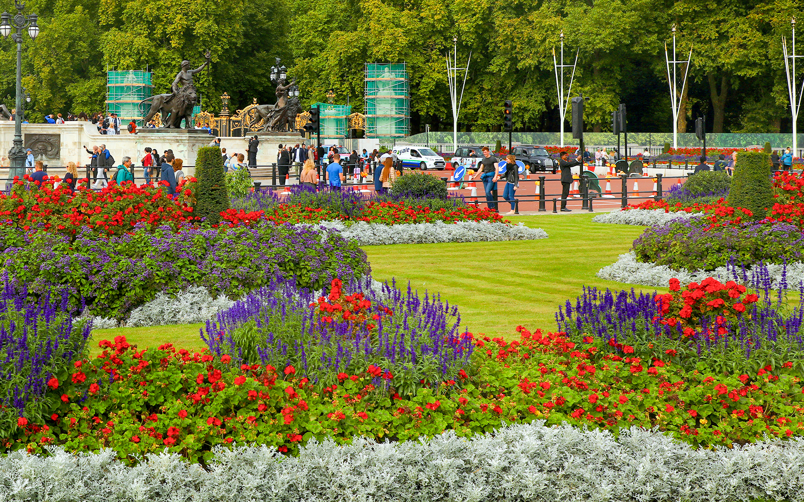 Buckingham Palace garden with vibrant flowers in London.