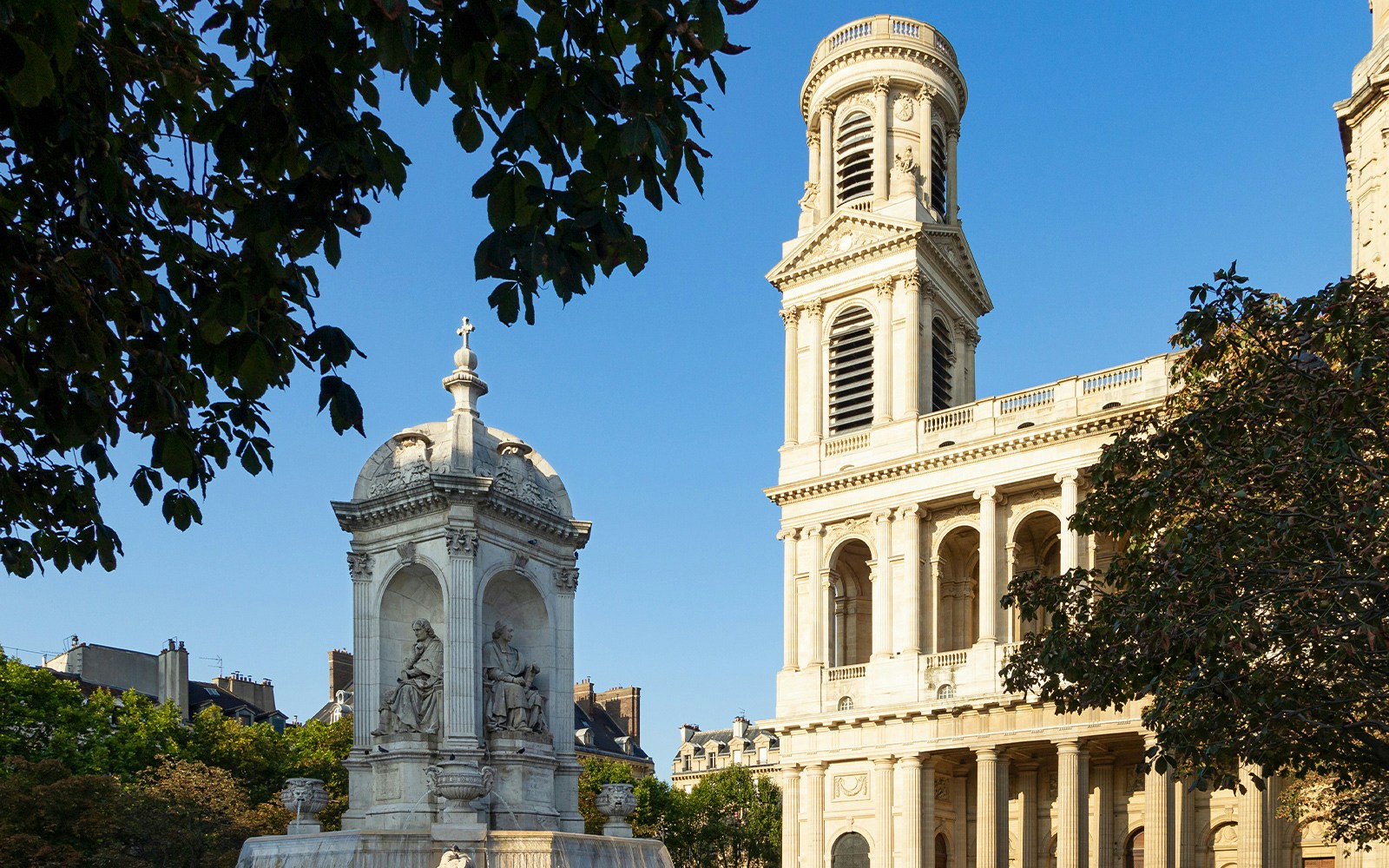 Saint Sulpice Church and fountain in Saint Germain des Prés, Paris.