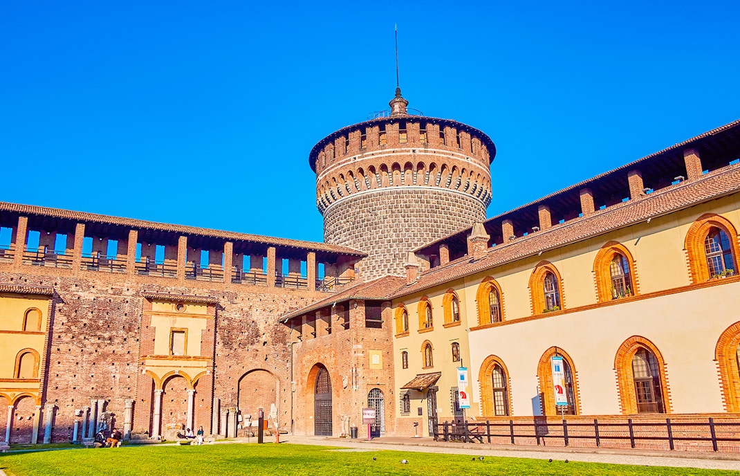 Sforza Castle battlements walkway in Milan, Italy, offering exclusive access and panoramic city views.