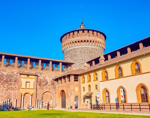 Sforza Castle battlements walkway in Milan, Italy, offering exclusive access and panoramic city views.