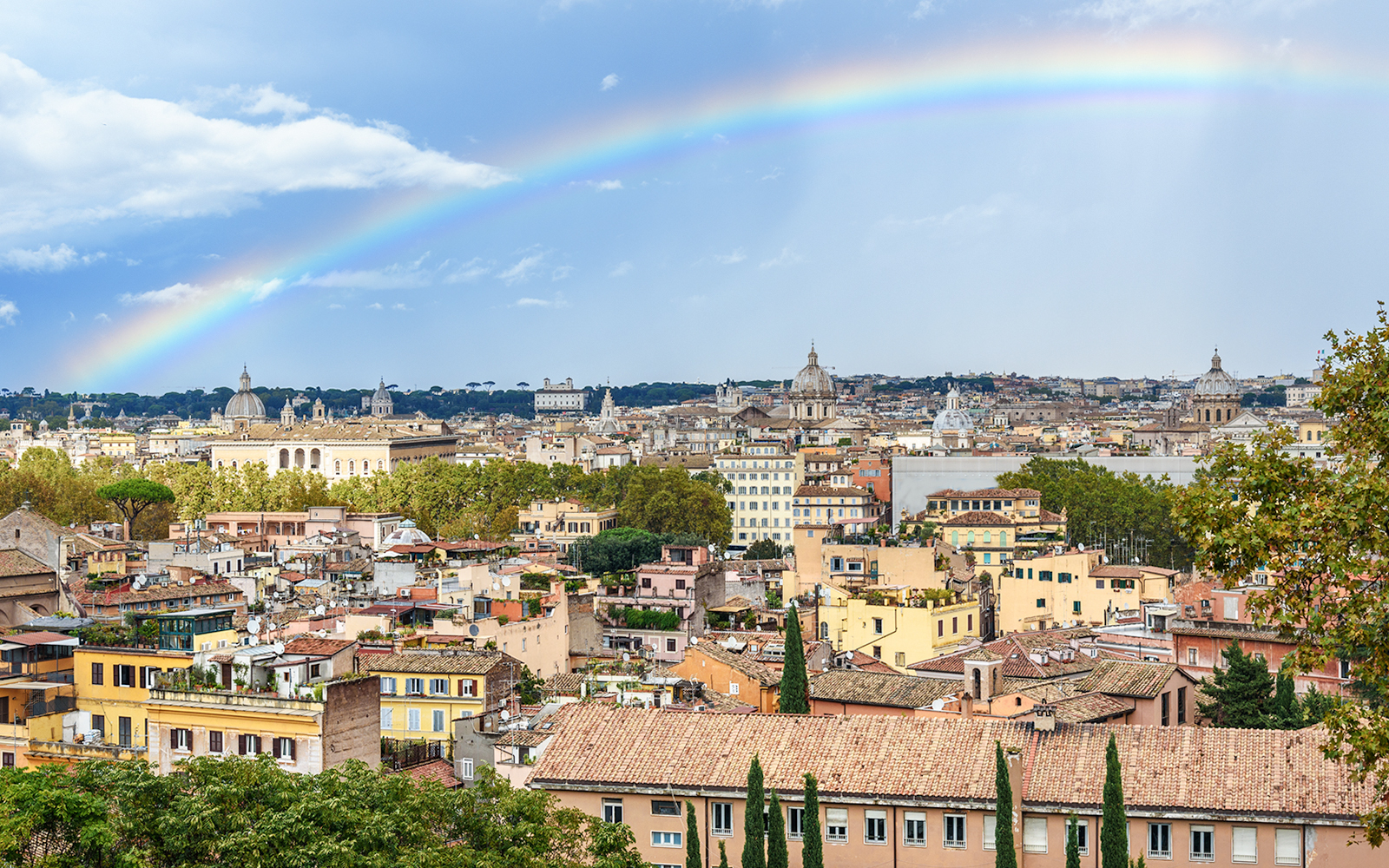Arial view of Rome with a rainbow from Janiculum Hill, Italy.