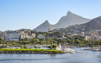 Speedboat tour view of Marina da Glória and Corcovado Mountain, Rio de Janeiro.