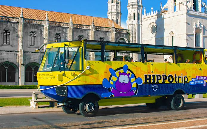 HIPPOtrip vehicle driving past Jerónimos Monastery in Lisbon.