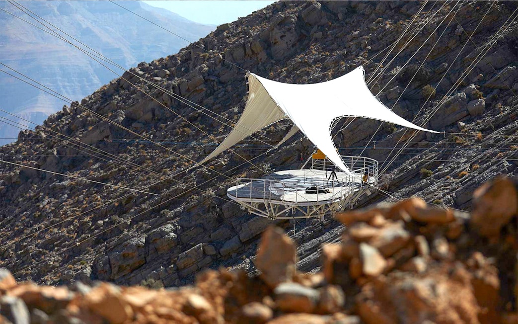 Jebel Jais Flight launch platform on rocky mountain slope in Dubai.