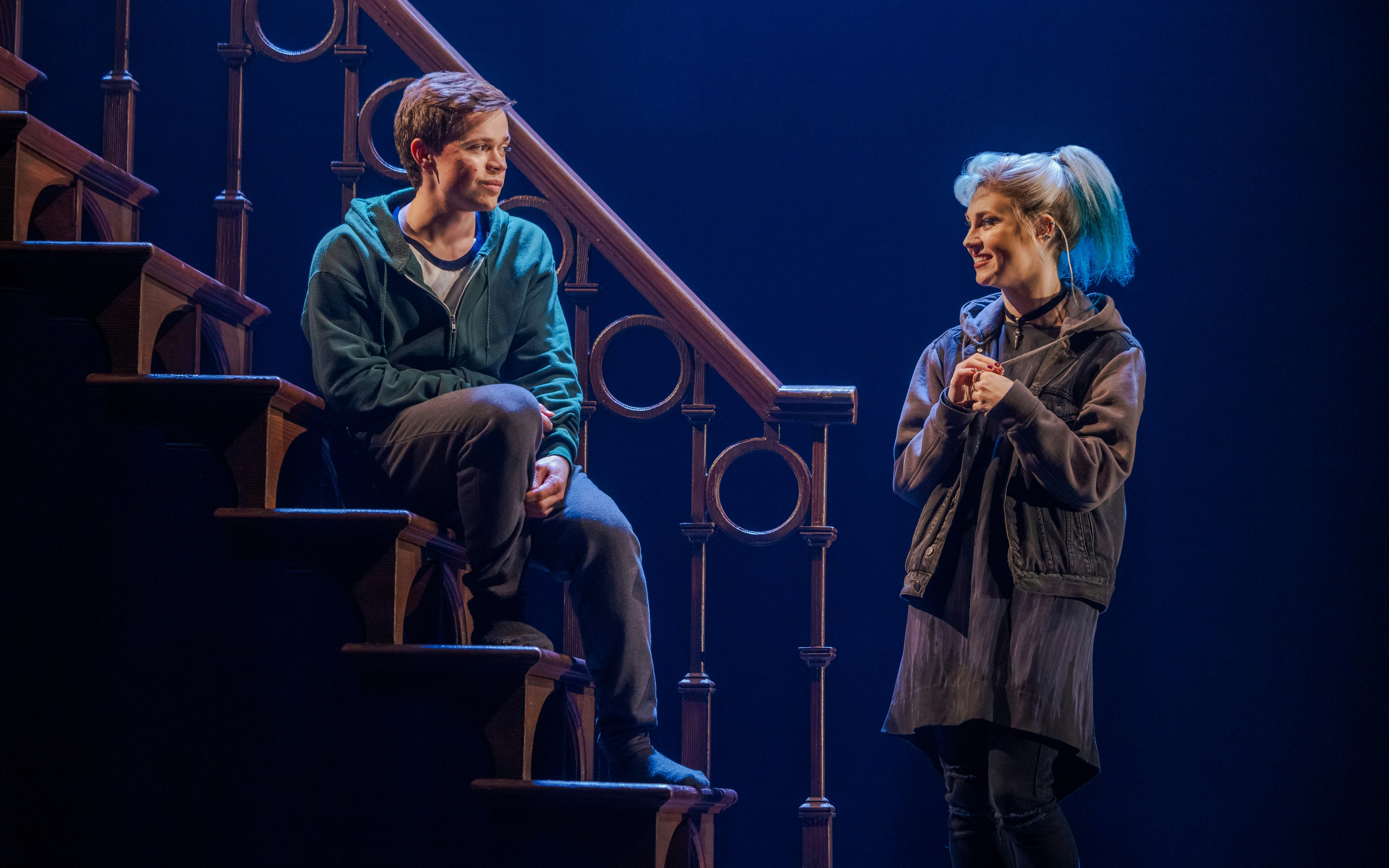 Actors performing a scene on a staircase in Harry Potter and the Cursed Child, Broadway.