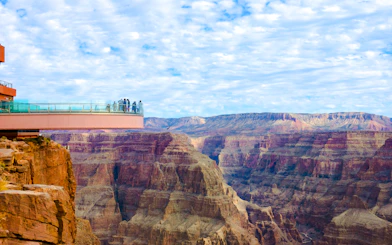 Visitors on the Skywalk glass bridge overlooking the Grand Canyon.